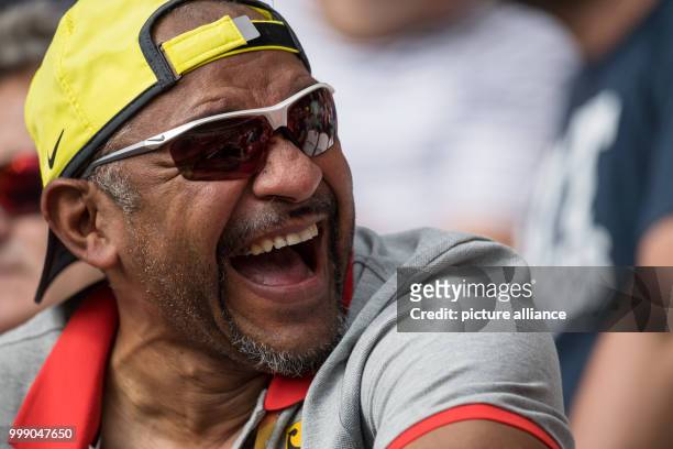 Idriss Gonschinska, the director of the German Light Athletics Association , follows the decathlon events at the IAAF World Championships in London,...