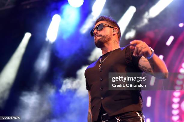 Keith Duffy of Boyzone performs on stage at Kew The Music at Kew Gardens on July 14, 2018 in London, England.