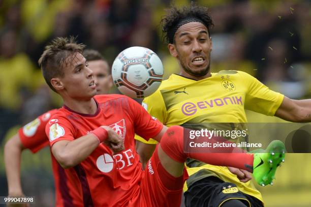 Rielasingen's Moritz Strauss and Dortmund's Pierre-Emerick Aubameyang vie for the ball during the German Soccer Association Cup first-round soccer...