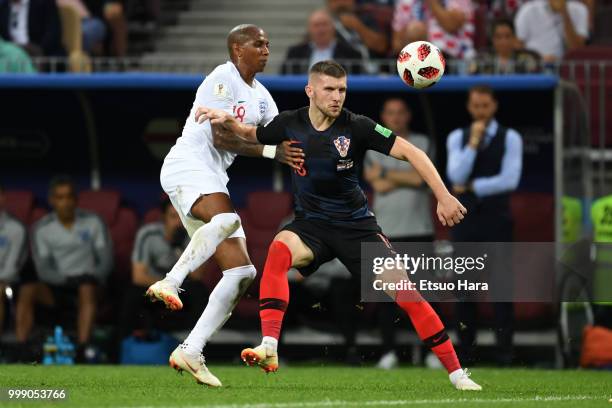 Ante Rebic of Croatia and Ashley Young of England compete for the ball during the 2018 FIFA World Cup Russia Semi Final match between England and...