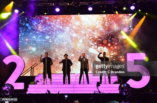 Mikey Graham, Shane Lynch, Ronan Keating and Keith Duffy of Boyzone perform on stage at Kew The Music at Kew Gardens on July 14, 2018 in London,...