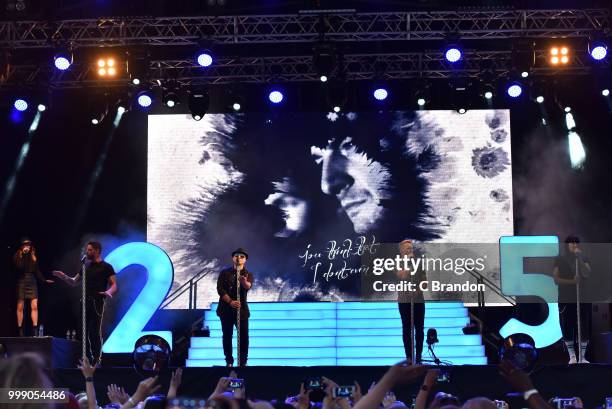 Mikey Graham, Shane Lynch, Ronan Keating and Keith Duffy of Boyzone perform on stage at Kew The Music at Kew Gardens on July 14, 2018 in London,...