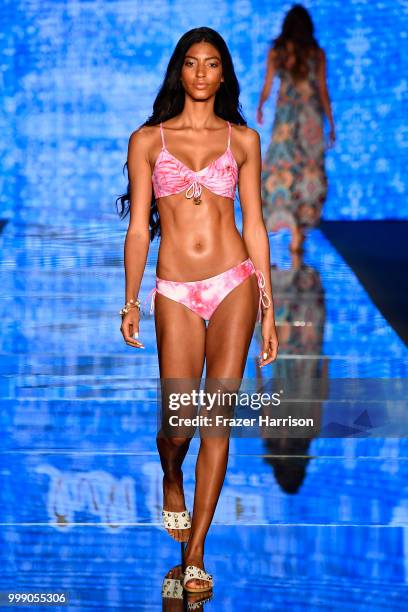 Model walks the runway for Luli Fama during the Paraiso Fashion Fair at The Paraiso Tent on July 14, 2018 in Miami Beach, Florida.