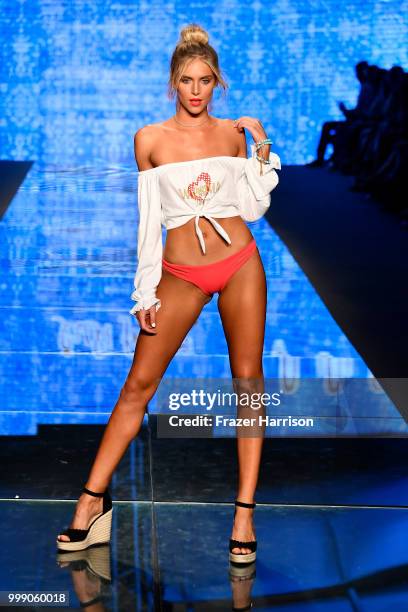 Model walks the runway for Luli Fama during the Paraiso Fashion Fair at The Paraiso Tent on July 14, 2018 in Miami Beach, Florida.