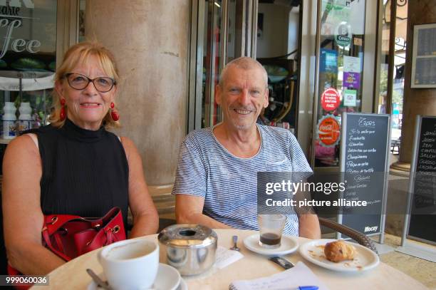 Yvonne Siebenmann and Peter Haudenschild sit in Bar Cristal in the Placa d'Espanya in Palma de Mallorca, Spain, 28 July 2017. Soaring property prices...