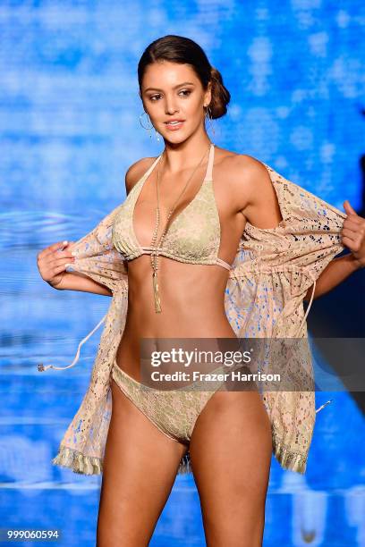 Model walks the runway for Luli Fama during the Paraiso Fashion Fair at The Paraiso Tent on July 14, 2018 in Miami Beach, Florida.