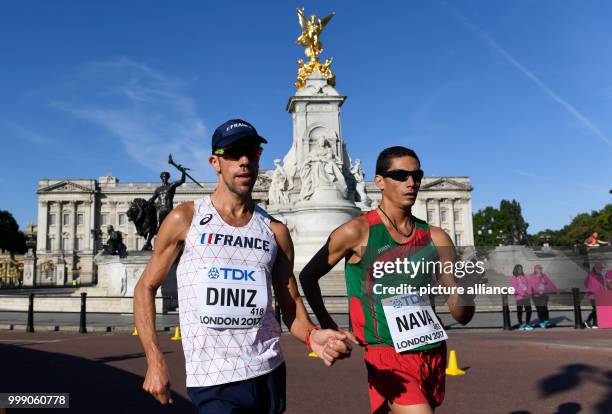 French athlete Yohann Diniz and Mexican athlete Horacio Nava compete in the 50 kilometer marathon at the IAAF London 2017 World Athletics...