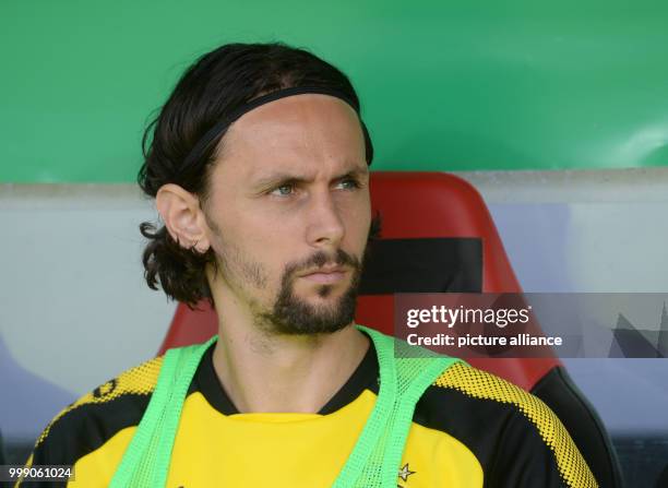 Dortmund's Neven Subotic on the substitutes' bench during the German Soccer Association Cup first-round soccer match between 1. FC Rielasingen-Arlen...