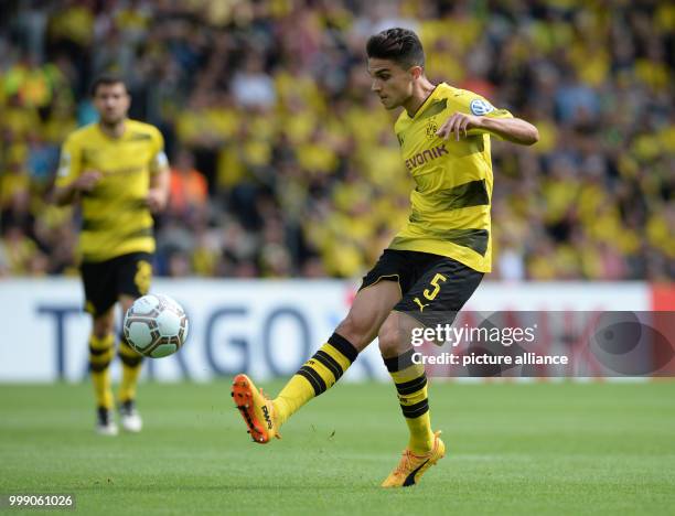 Dortmund's Marc Bartra plays the ball during the German Soccer Association Cup first-round soccer match between 1. FC Rielasingen-Arlen and Borussia...