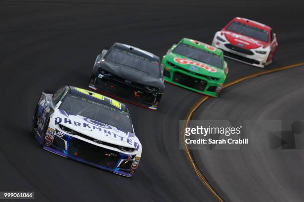 Kasey Kahne, driver of the Dark Matter presented by Ionomy Chevrolet, leads a pack of cars during the Monster Energy NASCAR Cup Series Quaker State...