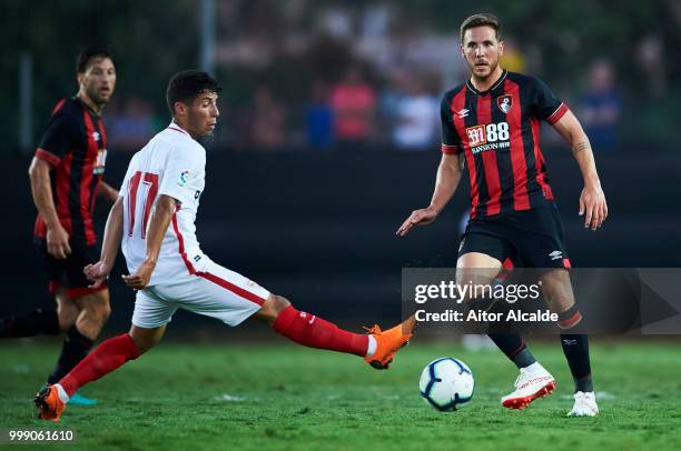 Dan Gosling of AFC Bournemouth controls the ball during Pre- Season friendly Match between Sevilla FC and AFC Bournemouth at La Manga Club on July...