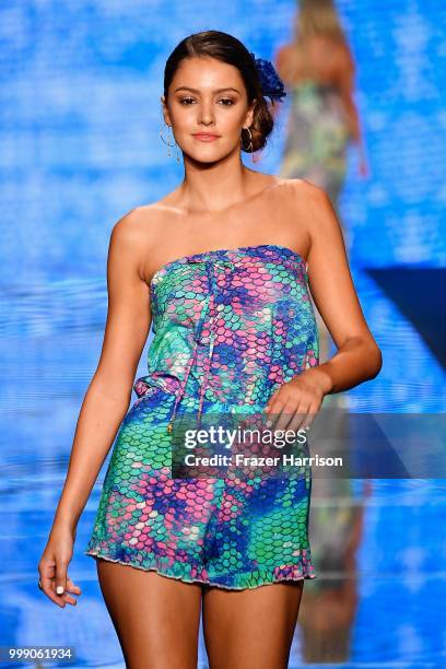 Model walks the runway for Luli Fama during the Paraiso Fashion Fair at The Paraiso Tent on July 14, 2018 in Miami Beach, Florida.