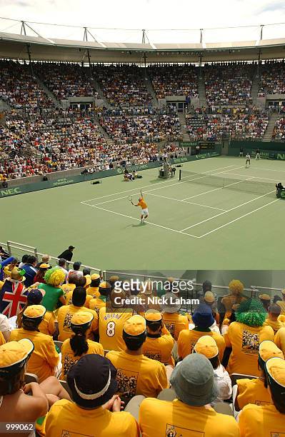 Lleyton Hewitt of Australia serves against Thomas Johansson of Sweden on day three of the Davis Cup semi final between Australia and Sweden held at...