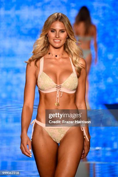 Natalie Roser walks the runway for Luli Fama during the Paraiso Fashion Fair at The Paraiso Tent on July 14, 2018 in Miami Beach, Florida.