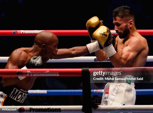 Moruti Mithalane of South Africa fight with Muhammad Waseem of Pakistan during their IBF Flyweight Title Bout boxing championship in Kuala Lumpur,...