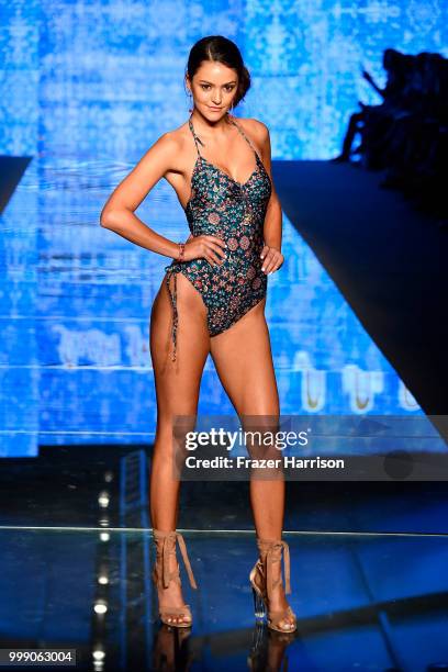 Model walks the runway for Luli Fama during the Paraiso Fashion Fair at The Paraiso Tent on July 14, 2018 in Miami Beach, Florida.