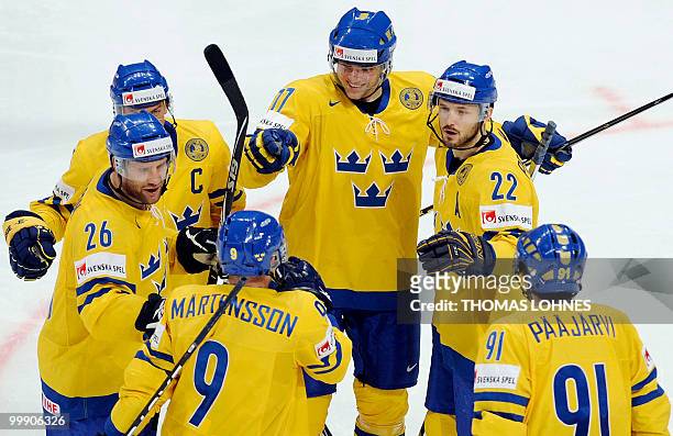 Sweden's celebrate scoring Sweden's Victor Hedman's goal during the IIHF Ice Hockey World Championship match Switzerland vs Sweden in the southern...