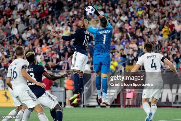 Los Angeles Galaxy goalkeeper David Bingham grabs the ball off the head of \109\ during a match between the New England Revolution and the Los...