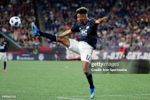 New England Revolution forward Juan Agudelo contrails the ball during a match between the New England Revolution and the Los Angeles Galaxy on July...