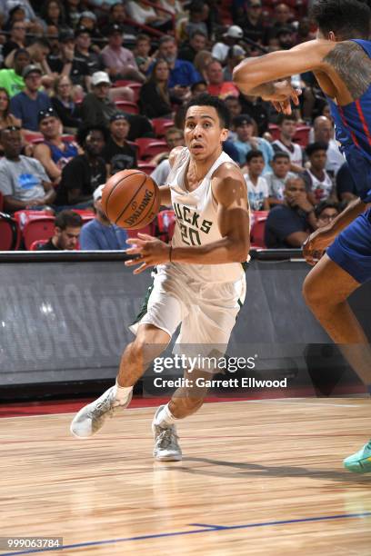 Travis Trice II of the Milwaukee Bucks handles the ball against the Philadelphia 76ers during the 2018 Las Vegas Summer League on July 14, 2018 at...