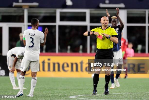 Referee Robert Sibiga red cards Los Angeles Galaxy defender Ashley Cole during a match between the New England Revolution and the Los Angeles Galaxy...