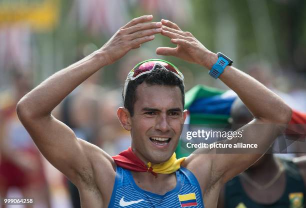 The Colombian walker Eider Arevalo celebrates his victory in the 20 kilometre race walk at the IAAF London 2017 World Athletics Championships in...