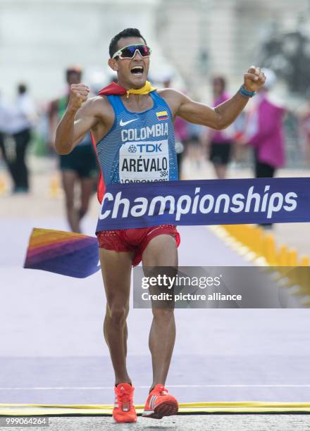 The Colombian walker Eider Arevalo celebrates his victory in the 20 kilometre race walk at the IAAF London 2017 World Athletics Championships in...