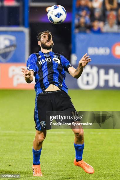 Montreal Impact midfielder Ignacio Piatti hits the ball with his chest and looks at it in the air during the San Jose Earthquakes versus the Montreal...