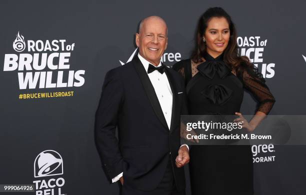 Bruce Willis and Emma Heming attend the Comedy Central Roast of Bruce Willis at Hollywood Palladium on July 14, 2018 in Los Angeles, California.