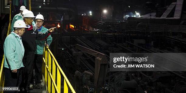 President Barack Obama tours through V & M Star, a leading producer of seamless pipe for the oil and gas industry, in Youngstown, Ohio, May 18, 2010...