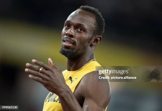 Sprinter Usain Bolt of Jamaica can be seen at the final race of the 4 x 100 metres relay at the IAAF London 2017 World Athletics Championships in...