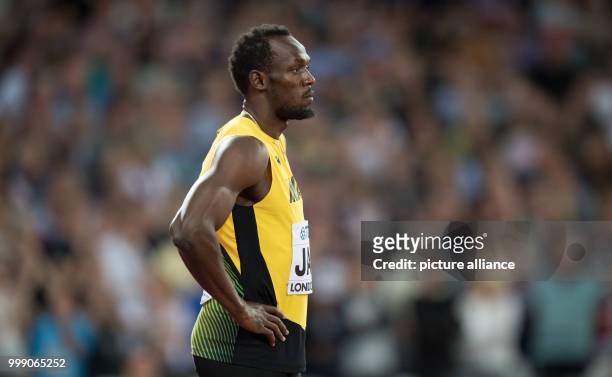 Sprinter Usain Bolt of Jamaica can be seen at the final race of the 4 x 100 metres relay at the IAAF London 2017 World Athletics Championships in...