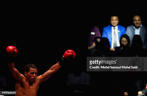 Carlos Canizales of Venezuela celebrated after againts Lu Bin of China during their World light flyweight boxing championship title bout in Kuala...
