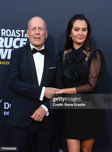 Bruce Willis and Emma Heming attend the Comedy Central Roast of Bruce Willis at Hollywood Palladium on July 14, 2018 in Los Angeles, California.