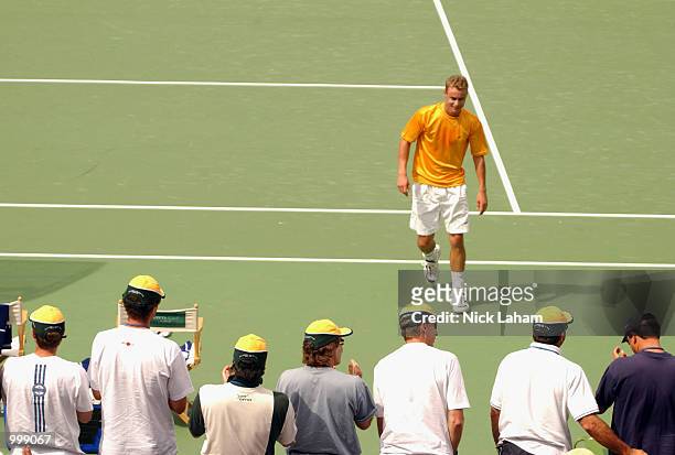 Lleyton Hewitt of Australia is clapped from the court by his Australian team mates after hi victory over Thomas Johansson of Sweden on day three of...