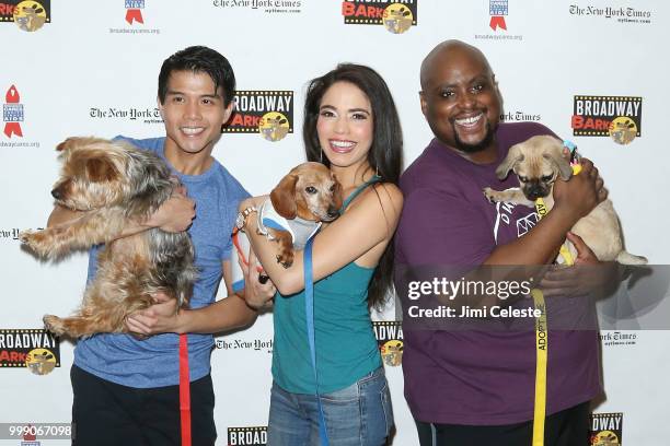 Telly Leung, Arielle Jacobs and Major Attaway attend the 20th Anniversary Of Broadway Barks at Shubert Alley on July 14, 2018 in New York City.