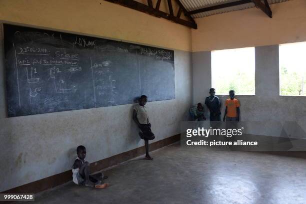 Children standing in a classroom in the Bidi Bidi refugee settlement in northwestern Uganda, 28 June 2017. Uganda is praised throughout the...