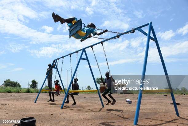 Children playing at a playground in the Bidi Bidi refugee settlement in northwestern Uganda, 28 June 2017. Uganda is praised throughout the...
