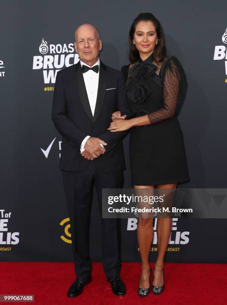 Bruce Willis and Emma Heming attend the Comedy Central Roast of Bruce Willis at Hollywood Palladium on July 14, 2018 in Los Angeles, California.