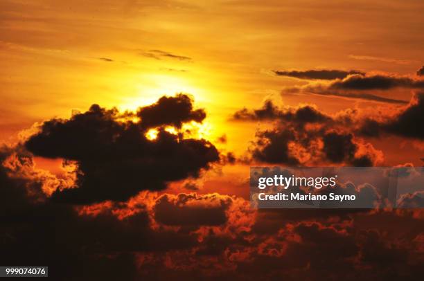 sunset cloud silhoutte - mariano stock pictures, royalty-free photos & images