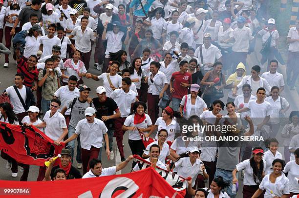 Honduran teachers, students and members of the National Front of Popular Resistance march in support of the teachers' statute, in Tegucigalpa, on May...
