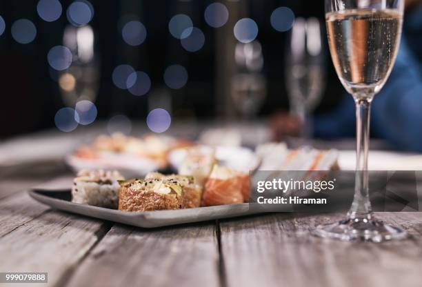 sushi if you're not fussy - canape stock pictures, royalty-free photos & images