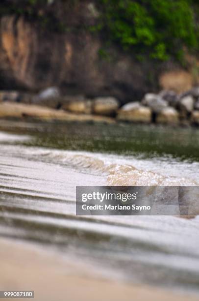 sea waves and sand - mariano stock pictures, royalty-free photos & images