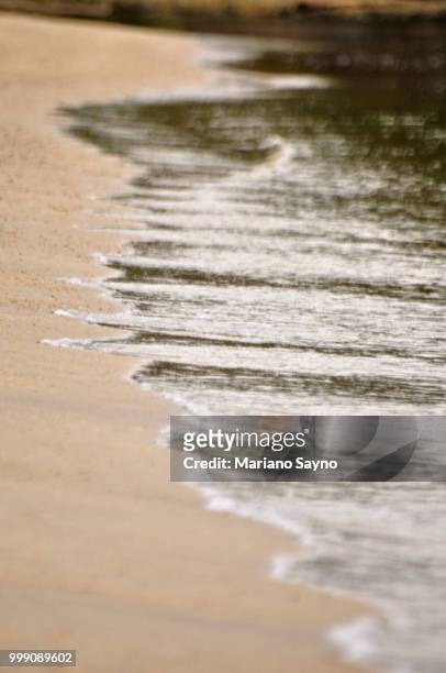 sea waves and sand - mariano 個照片及圖片檔