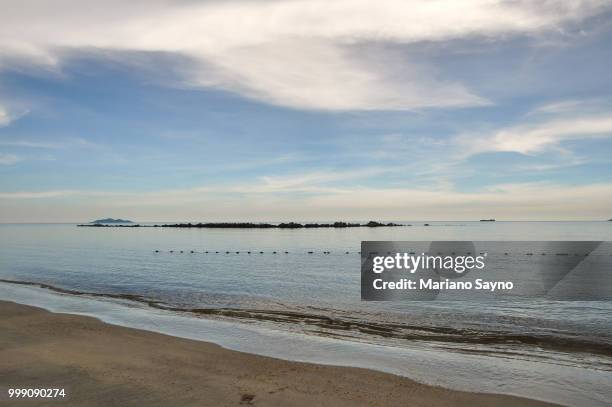 sea shore in beach before sunset - mariano stock pictures, royalty-free photos & images