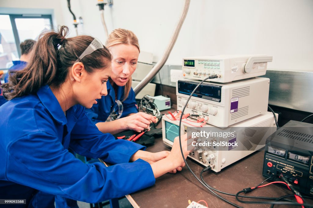 Engineering Tutor Engineering Tutor Helping Her Student High-Res Stock Photo - Getty Images