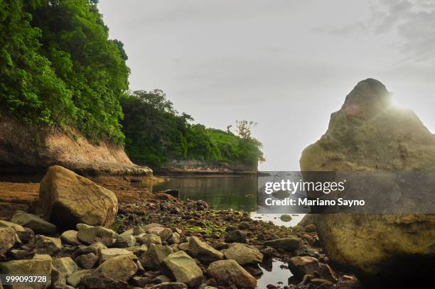 rocks on the shore - mariano stock pictures, royalty-free photos & images