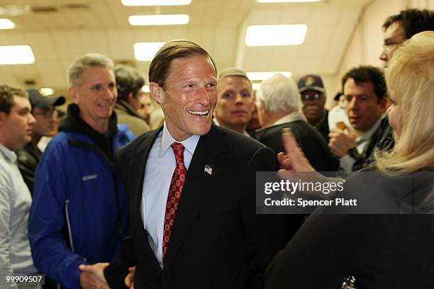 Democratic senatorial candidate, Attorney General of Connecticut Richard Blumenthal greets supporters after holding a press conference to explain the...