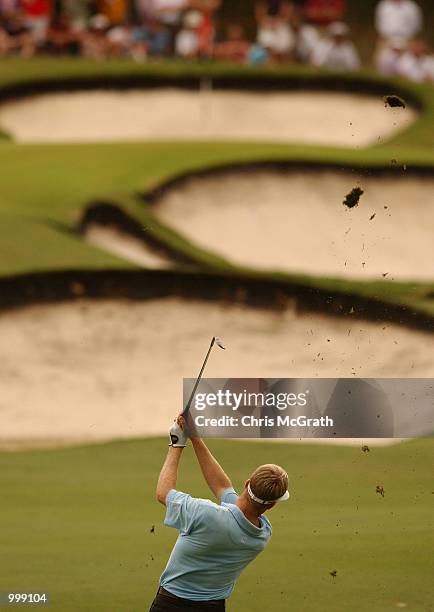 Stuart Appleby of Australia plays an approach shot to the tenth hole during the final round of the Holden Australian Open Golf Tournament held at The...