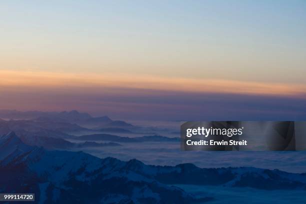 view on a sea of fog over the foothills of the swiss alps from mt. hoher kasten, canton appenzell innerrhoden, switzerland - appenzell innerrhoden stock pictures, royalty-free photos & images
